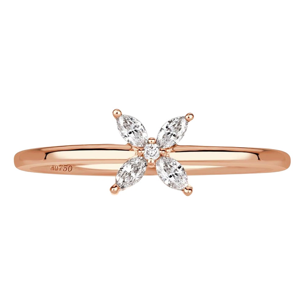 0.15ct Pear Shaped and Round Brilliant Cut Diamond Floral Ring in 18k Rose Gold