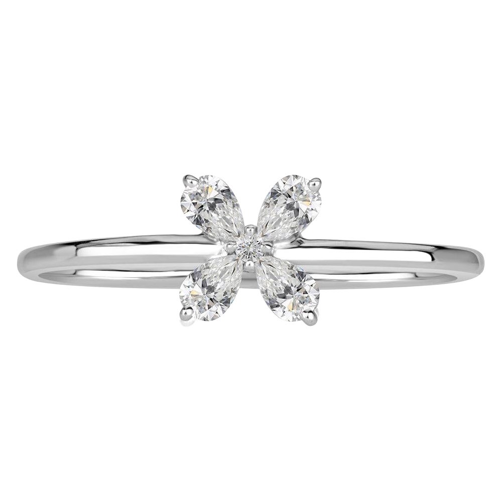 0.15ct Pear Shaped and Round Brilliant Cut Diamond Floral Ring in 18k White Gold For Sale