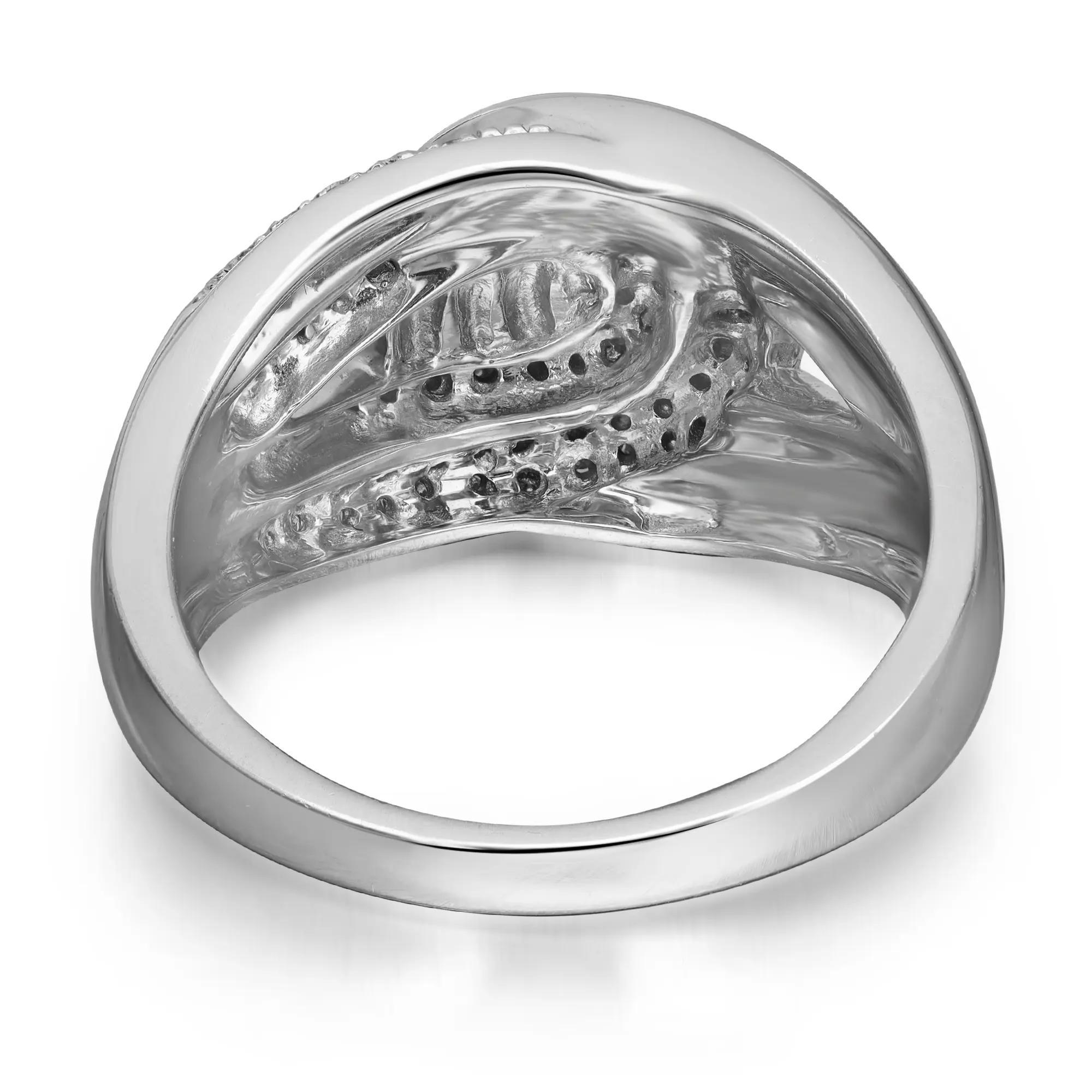Mutiger und eleganter Diamantring aus hochglanzpoliertem 14-karätigem Weißgold. Dieser Ring enthält funkelnde Diamanten mit rundem Schliff in einer Zackenfassung von insgesamt 0,15 Karat. Qualität des Diamanten: Farbe I und Reinheit SI. Ringgröße: