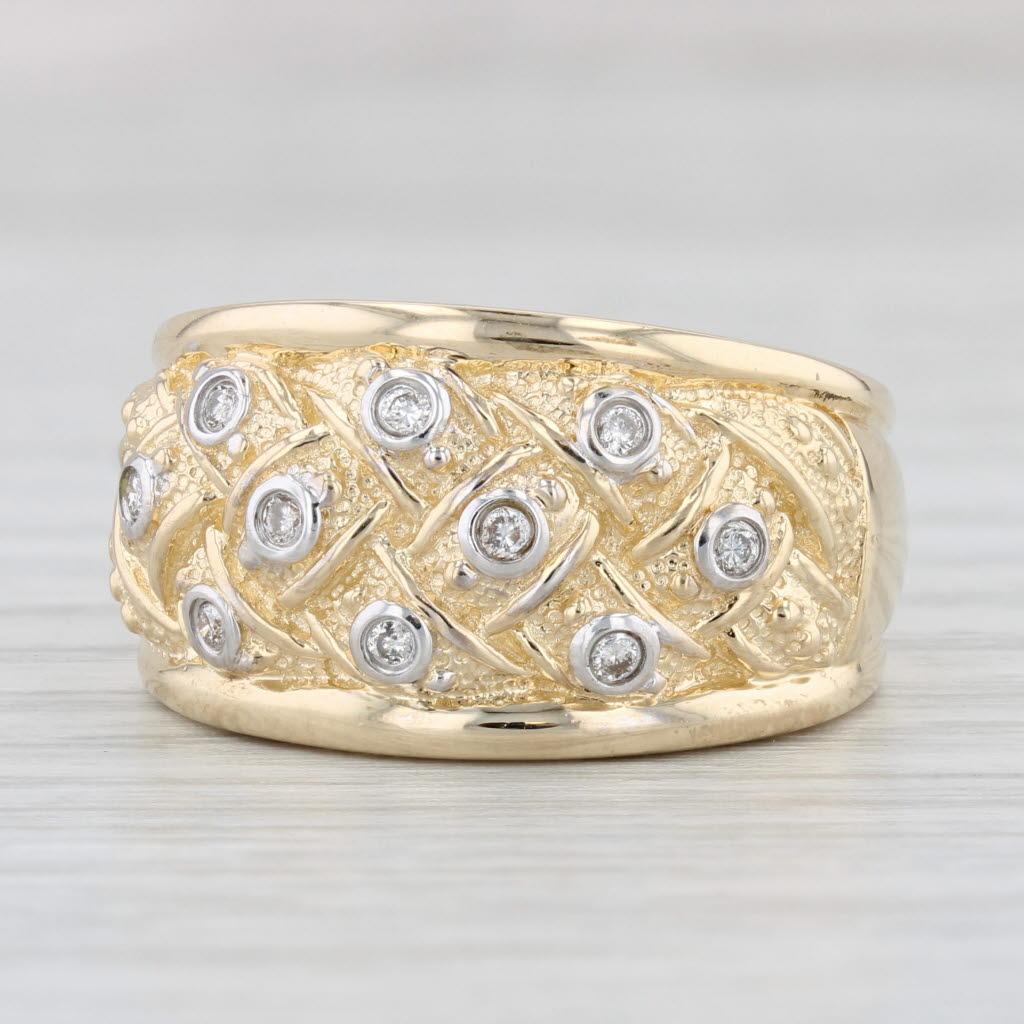 Gemstone Information:
- Natural Diamonds -
Total Carats - 0.15ctw
Cut - Round Brilliant
Color - I - K
Clarity - SI2 - I1

Metal: 14k Yellow Gold, White Gold Settings
Weight: 7.2 Grams 
Stamps: 14k
Face Height: 12.5 mm 
Rise Above Finger: 4.6 mm
Band