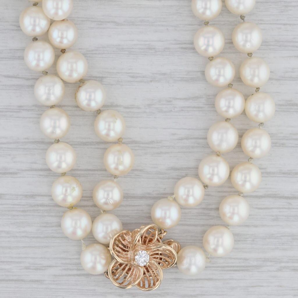 Collana a due fili di perle coltivate con diamanti da 0,15 carati, chiusura a fiore in oro 14k in vendita