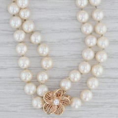 Collana a due fili di perle coltivate con diamanti da 0,15 carati, chiusura a fiore in oro 14k