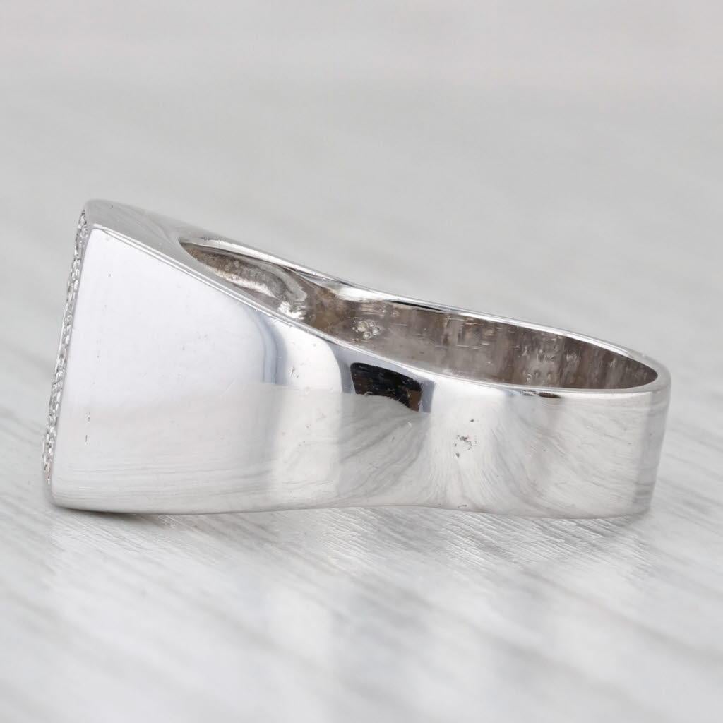 Gemstone Information:
- Natural Diamonds -
Total Carats - 0.15ctw 
Cut - Single
Color - G - H
Clarity - VS2 - SI1

Metal: 14k White Gold
Weight: 5.6 Grams 
Stamps: 14k
Face Height: 10.8 mm 
Rise Above Finger: 4 mm
Band / Shank Width: 5 mm

This ring