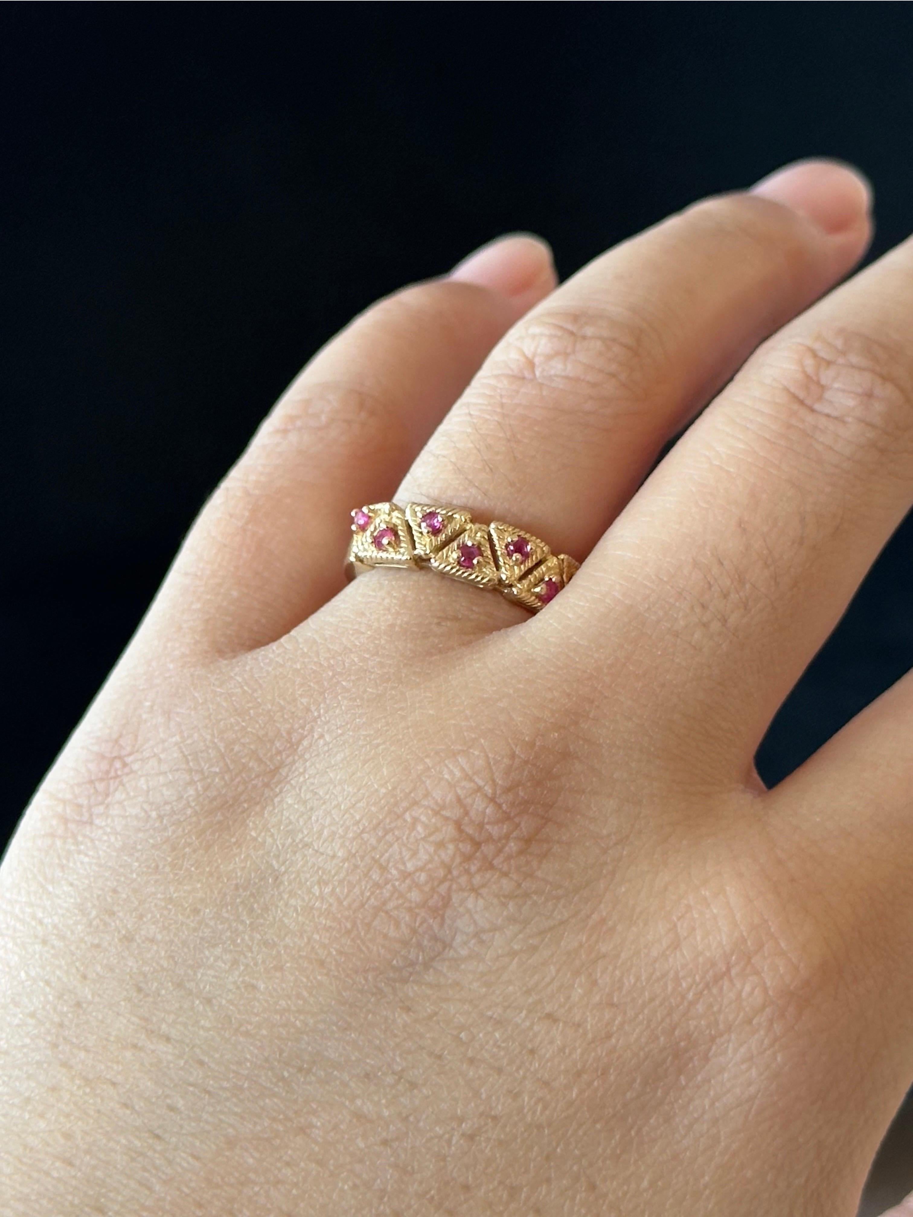 14k Yellow Gold Ring with Approx. 0.15ctw of Small
Rubies.

Center Stone: Ruby
Gold Purity: 14K Solid Gold 
Gold Color:  Yellow Gold 
Total Weight: 3.64g