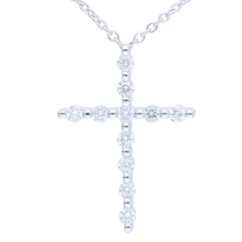     Diamond Carat Weight: This charming cross necklace showcases a total of 0.16 carats of diamonds. The necklace is adorned with 11 round-cut diamonds, each carefully chosen for its brilliance and fire, contributing to an understated yet