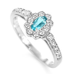 0.16 Carat Natural Brazilian Paraiba Tourmaline & Diamond Ring Made in Platinum