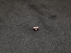 IGI, 0.16 Carat Natural Fancy Orangy Pink Round Shape Loose Diamond