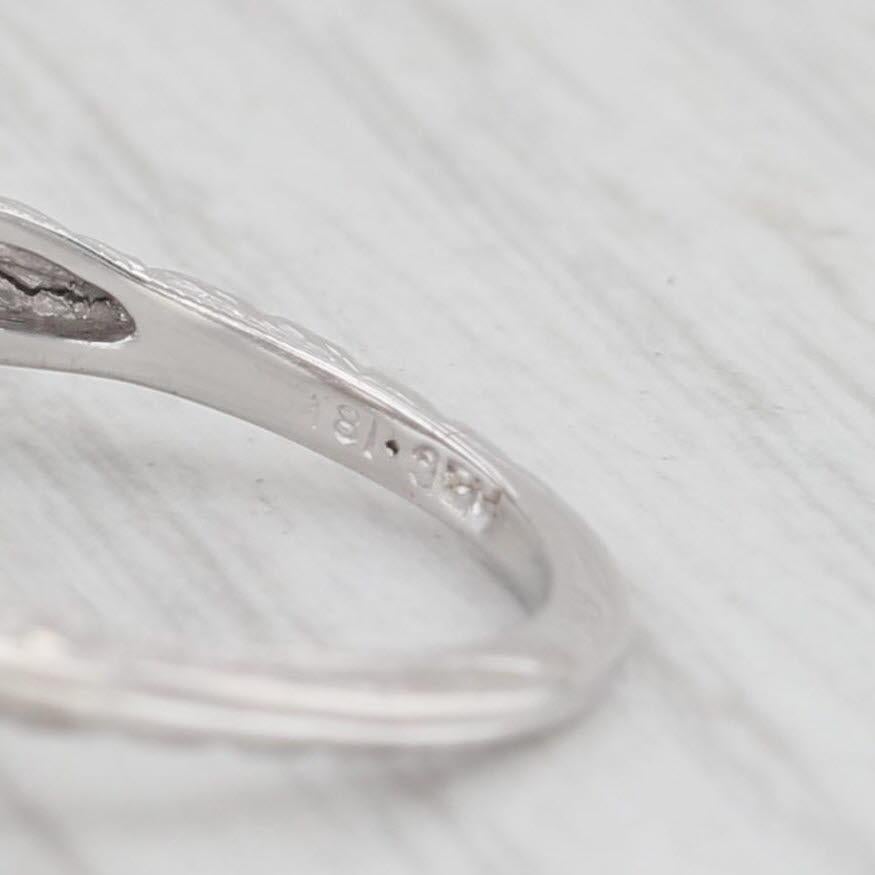 Gemstone Information:
- Natural Diamond -
Carats - 0.16ctw 
Cut - Transitional 0.09ct, 0.07ctw Single
Color - G
Clarity - VS2

Metal: 18k White Gold 
Weight: 2.9 Grams 
Stamps: 18k
Face Height: 9.3 mm
Rise Above Finger: 6.2 mm
Band / Shank Width: