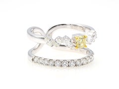 0.17 Carat Natural Fancy Light Yellow Diamond Ring
