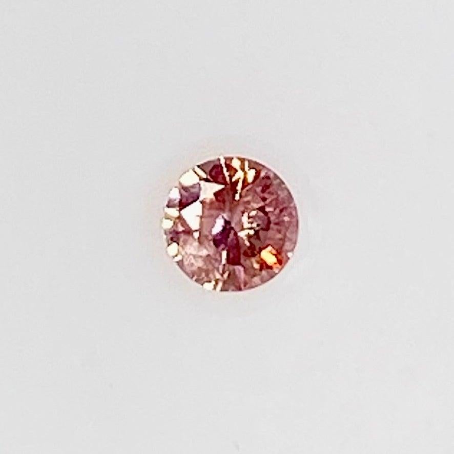 0.17 CARAT ROUND NATURAL FANCY ORANGY PINK EVEN PINK DIAMOND GIA CERTIFIED 0.17 CT FOP BY MIKE NEKTA NYC

GIA NATURAL COLORED DIAMOND

Shape and Cutting Style : Round Brilliant 
Measurements: 3.5 - 3.5 x 2.1 mm
Carat Weight : 0.17 carat 
Color Grade