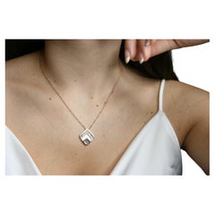 0.17 Carat Vs G Diamonds on 18 Carat Rose Gold Mother Of Pearl Pendant