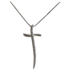 0.17 Carats Diamonds on 18K White Gold Chain and Sinuous Cross 0.17 Carats Diamonds on 18K White Gold Chain and Sinuous Cross