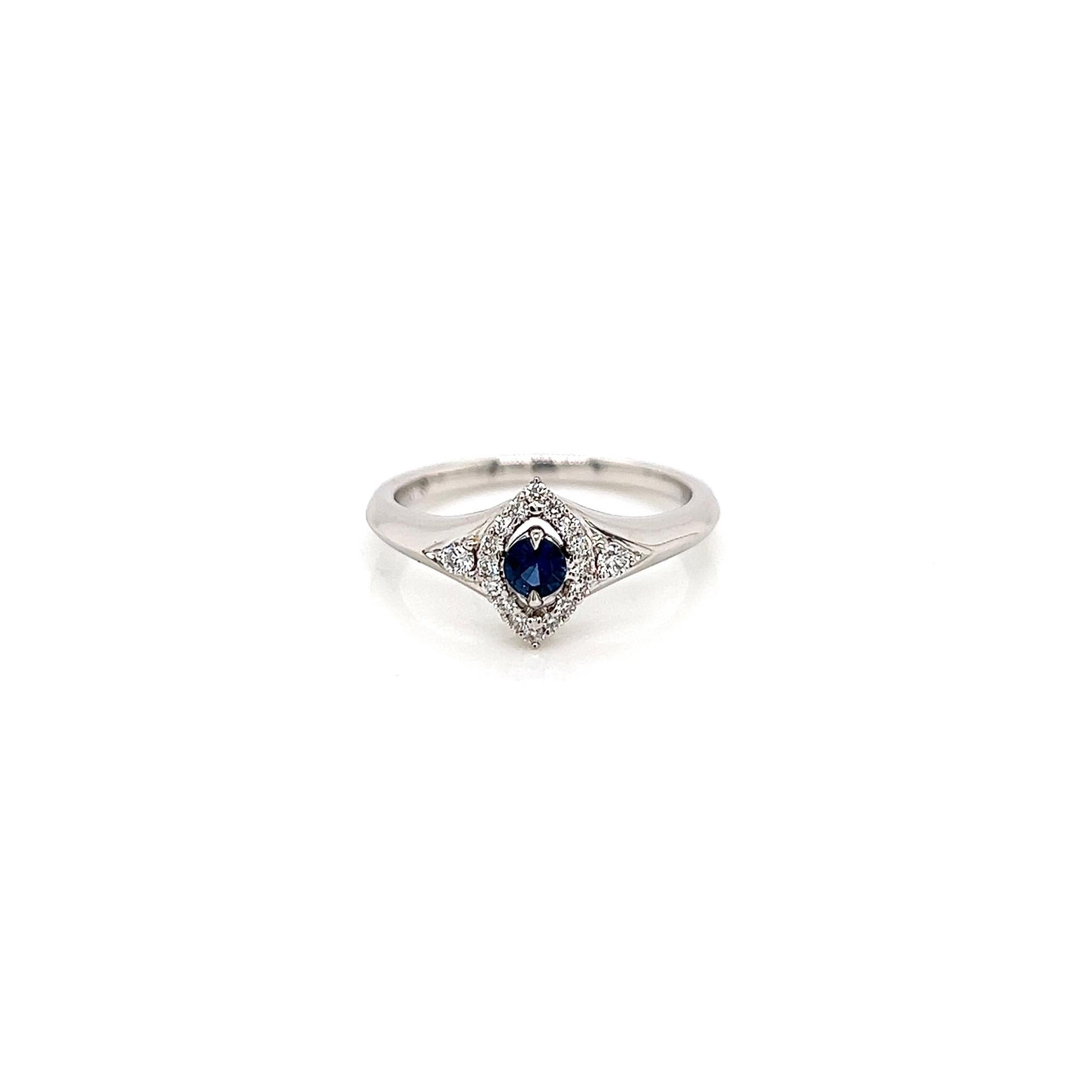 0.33 Total Carat Sapphire Diamond Halo Engagement Ring

-Metal Type: 18K White Gold
-0.17 Carat Round Blue Sapphire
-0.16 Carat Round Side Diamonds 
-Size 6.75

Made in New York City.