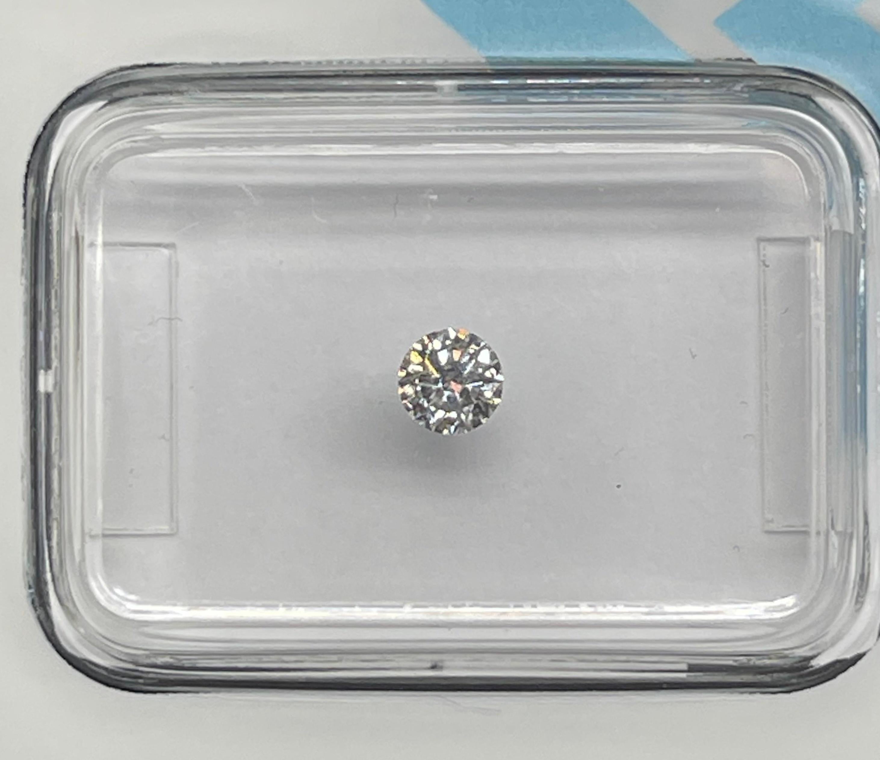 Natural Diamond graded by IGI.

Shape: Round Brilliant
Weight: 0.17 CT
Color: D
Clarity: VVS2
Cut: Very Good
Polish: Very Good
Symmetry: Excellent
Fluorescence: None
Laser inscription : IGI 630434201