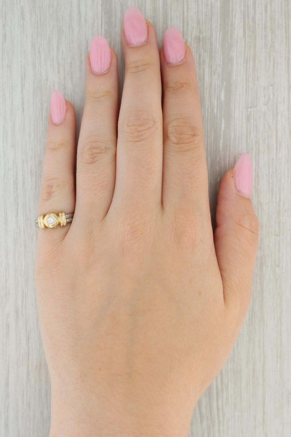 Gemstone Information:
- Natural Diamond -
Carats - 0.17ct 
Cut - Round Brilliant
Color - G - H
Clarity - I1

Metal: 14k White & Yellow Gold
Weight: 5.1 Grams 
Stamps: 14k
Face Height: 7.1 mm 
Rise Above Finger: 3.7 mm
Band / Shank Width: 3.8