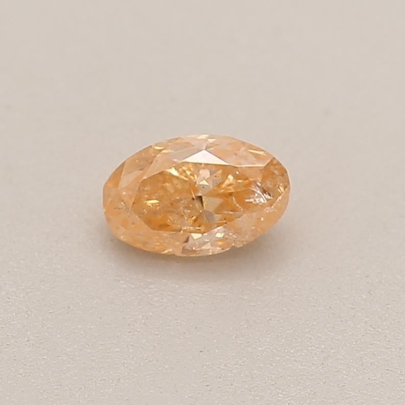 *100% NATURAL FANCY COLOUR DIAMOND*

✪ Diamond Details ✪

➛ Shape: Oval
➛ Colour Grade: Fancy Orange
➛ Carat: 0.18
➛ GIA Certified 

^FEATURES OF THE DIAMOND^

Our Oval oval-shaped diamond is characterized by its elongated, elliptical outline with