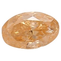 0.18 Carat Fancy Orange Oval cut diamond GIA Certified