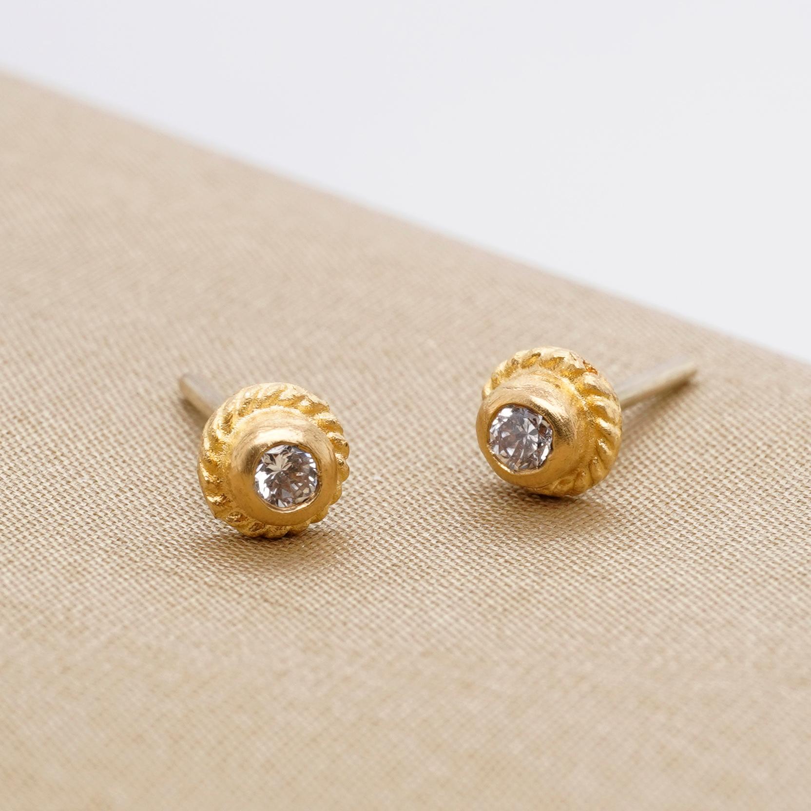 Circle Textured Stud Earrings with Diamonds in 24kt Gold by Prehistoric Works of Istanbul, Turkey. Measures: 5.25mm x 5.25mm. 24kt Gold: 1.25 g; Diamonds: 0.18 ct