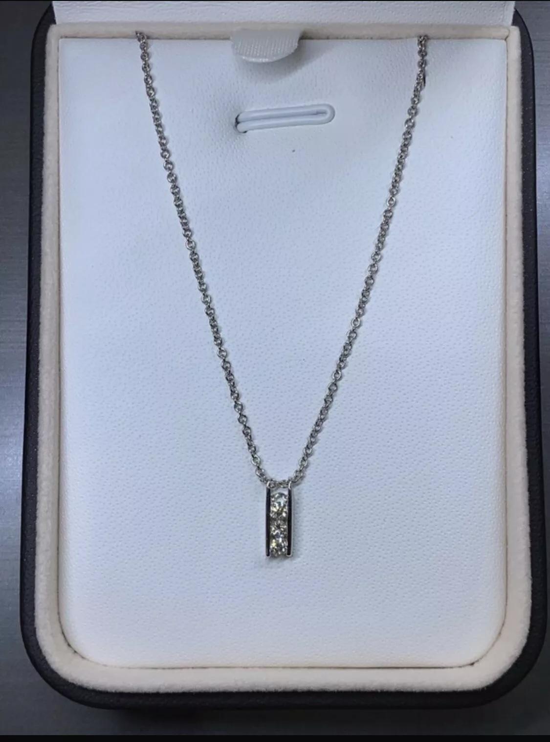 Collana con ciondolo solitario con diamante da 0,18 ct. in oro bianco 14 ct. in vendita 1