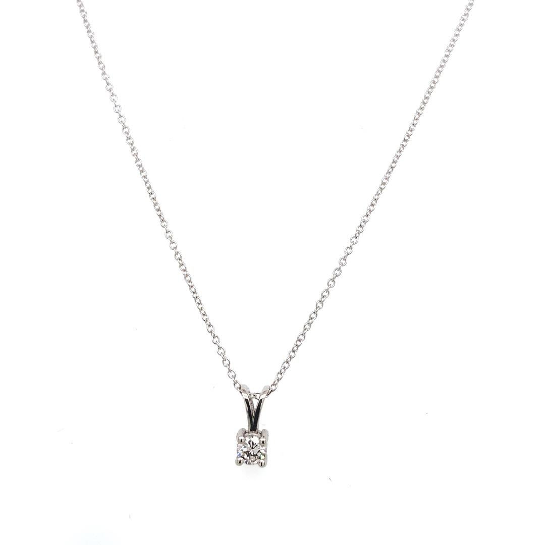 18ct White Gold 0.18ct Round Brilliant Cut Diamond Pendant with Chain.

Additional Information:
Total Diamond Weight: 0.18ct
Diamond Colour: I/ J
Diamond Clarity: VS
Total Weight: 2g 
Chain Length: 16-18