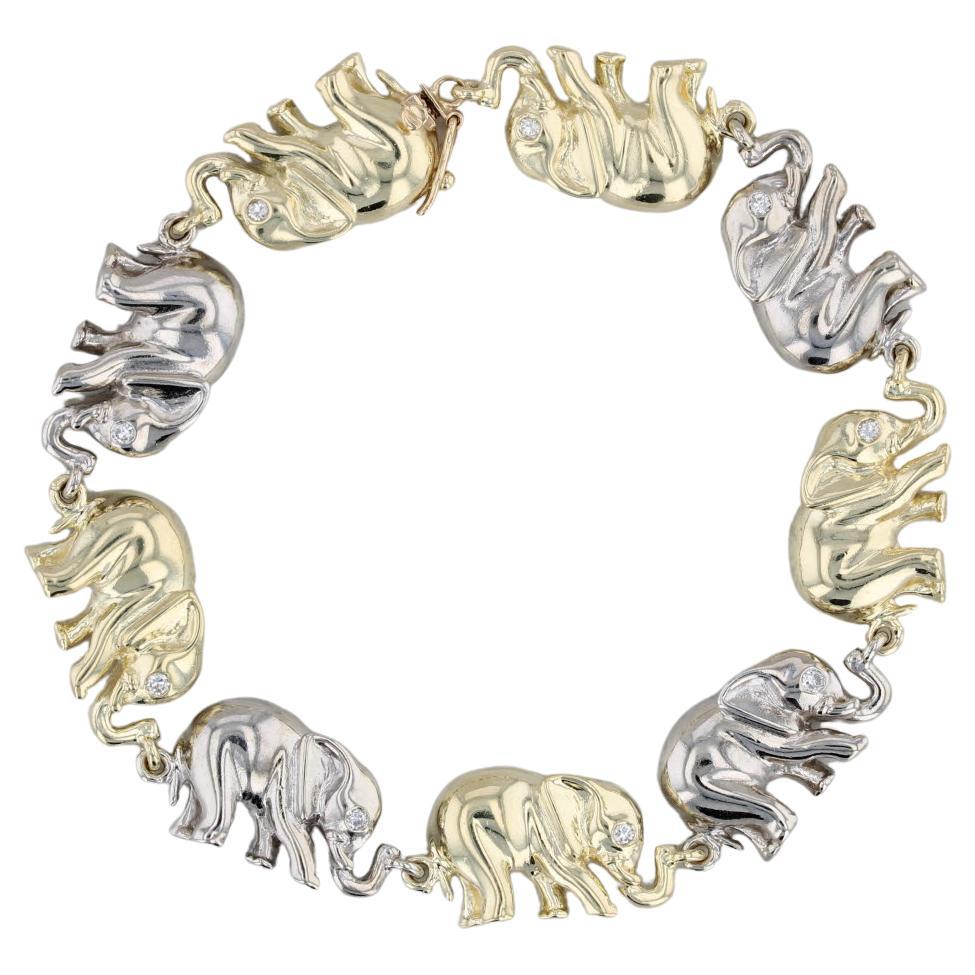 0.18ctw Diamond Eyed Elephant Bracelet 14k Yellow White Gold 7.25"