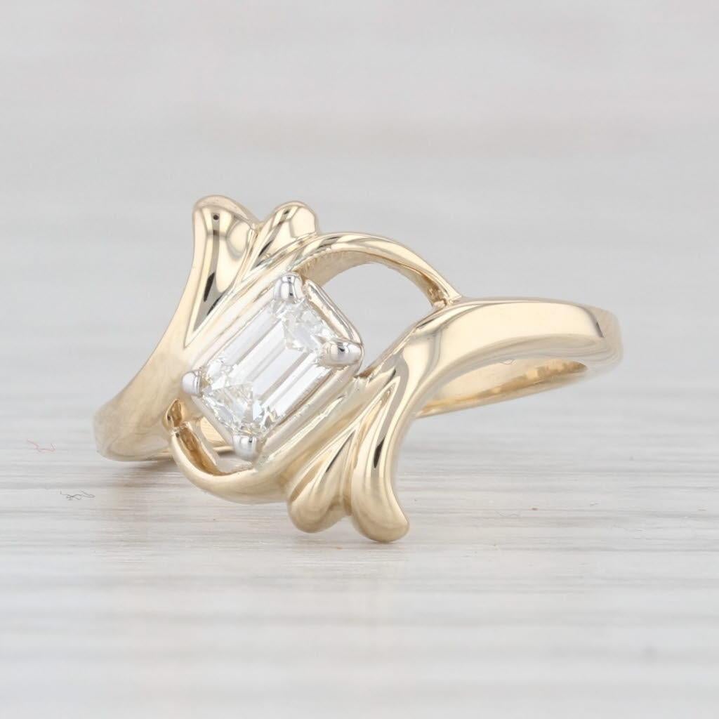 0.18ctw Emerald Cut Diamond Solitaire Bypass Ring 14k Yellow Gold Size 5 In Good Condition For Sale In McLeansville, NC