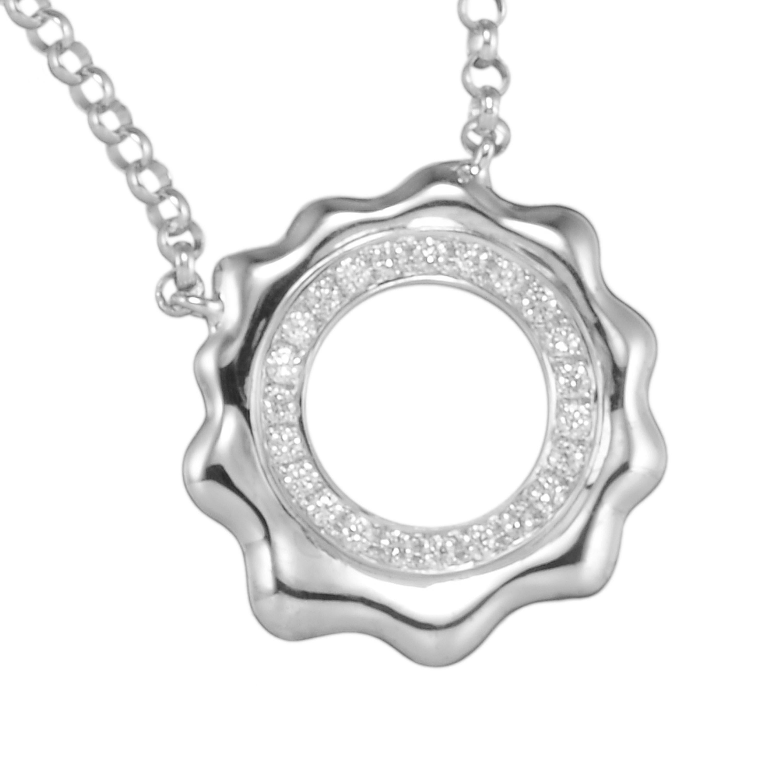 Cast in the shape of the sun, Butani's pendant necklace is handcrafted from 18-karat white gold and is encrusted with 0.19 carats of sparkling pavé diamonds.  Wear it solo or layered with other pieces.  Chain length 16 inches.

Composition:
18K