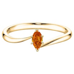 0.19 carat Fancy Vivid Yellowish Orange Diamond Marquise cut Gold 18K Ring