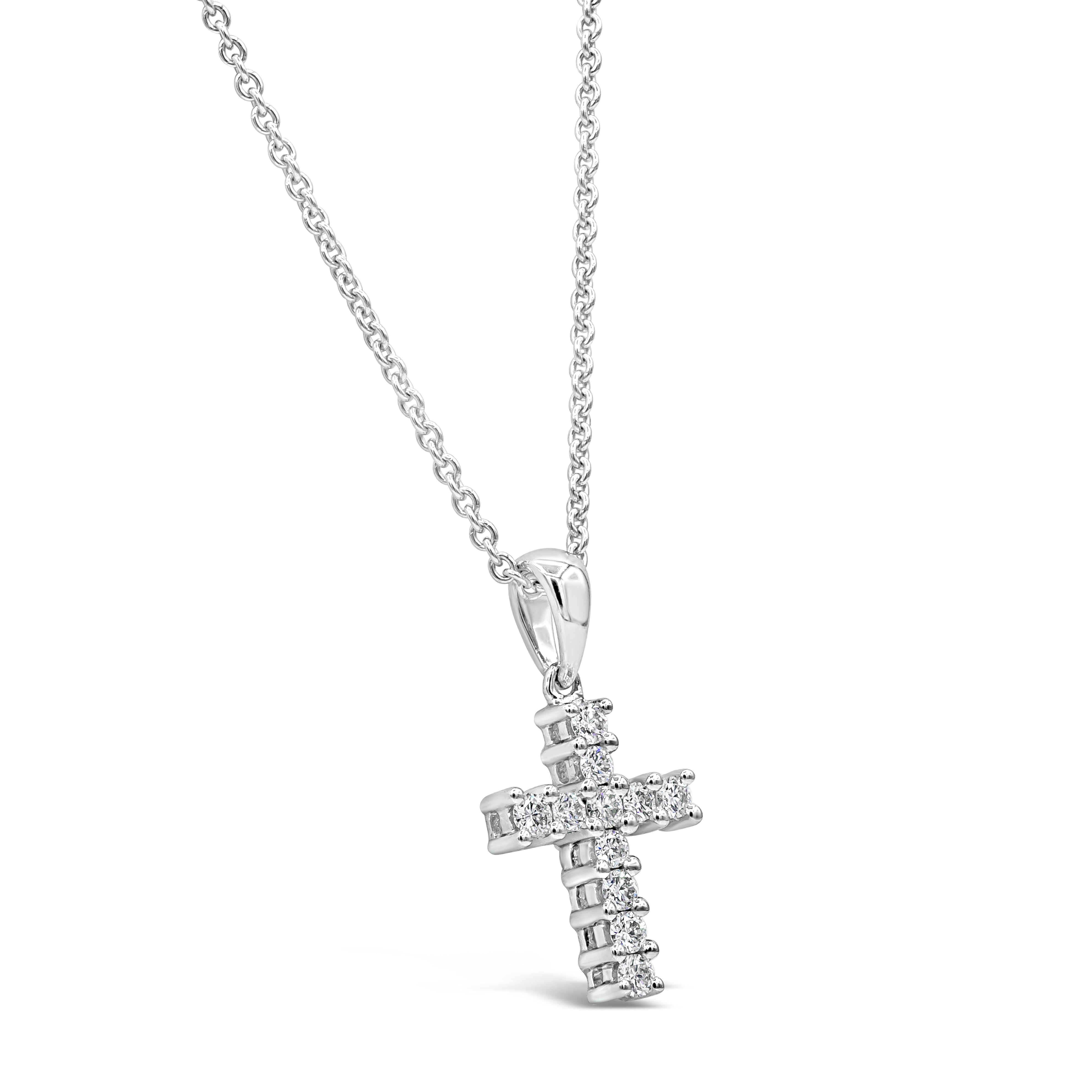 Showcasing round brilliant diamonds set in a traditional cross design made in 18 karat white gold. Diamonds weigh 0.19 carats total. Suspended on a 16 inch white gold chain (adjustable upon request).

Style available in different price ranges.