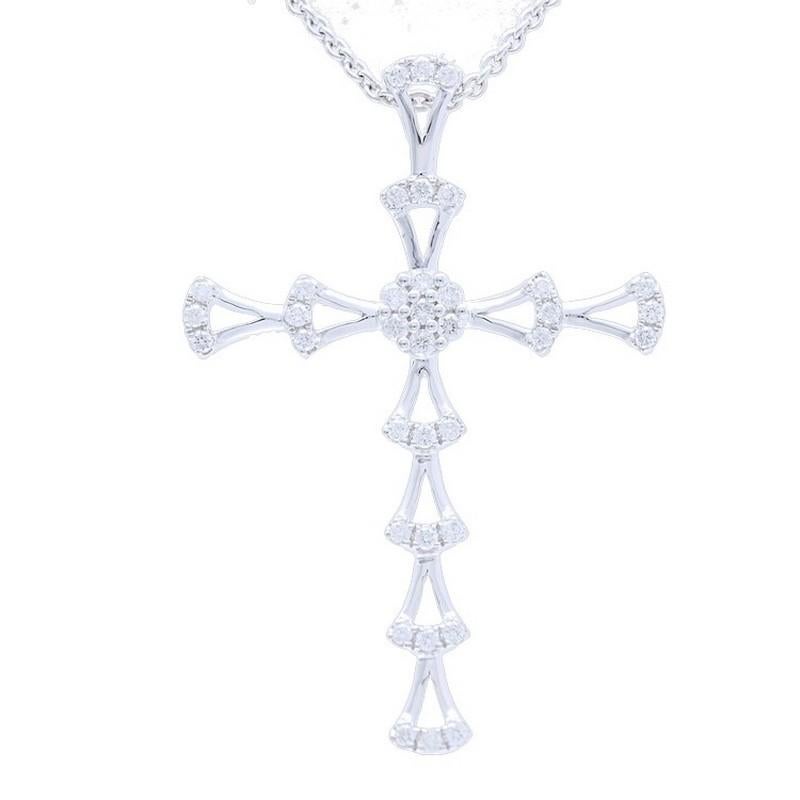     Diamond Carat Weight: The cross pendant boasts a total of 0.2 carats of diamonds. The design incorporates 37 round-cut diamonds, meticulously set to create a stunning and meaningful arrangement.

    Gold Type: Crafted with precision in 18K