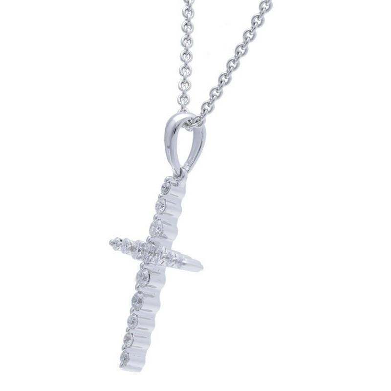 Diamond Carat Weight: This exquisite cross pendant is adorned with a total of 0.2 carats of diamonds. There are 15 round brilliant-cut diamonds, each carefully selected for their quality and brilliance. These diamonds create a dazzling and radiant