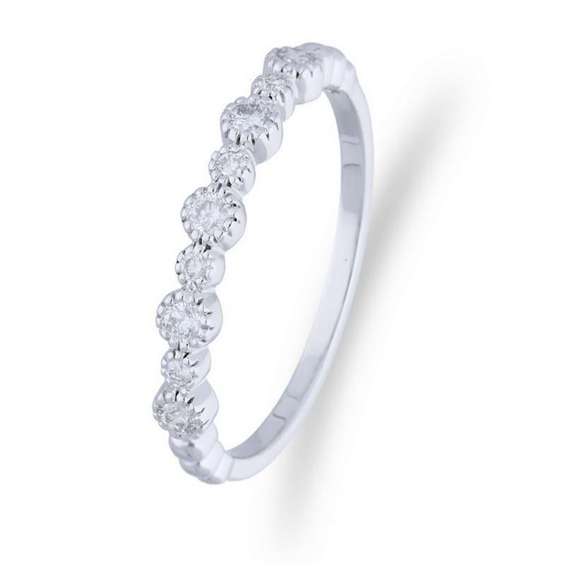 Diamond Carat Weight: This exquisite Gazebo Fancy Collection ring features a total of 0.2 carats of round diamonds, meticulously set in a bezel setting. The 9 round diamonds create a captivating and refined look.

Bezel Setting: The diamonds are