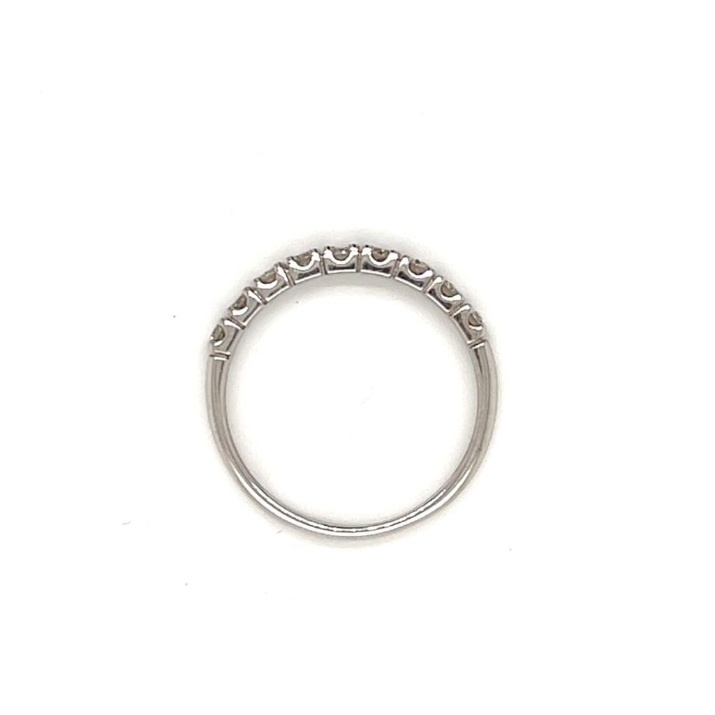 Contemporary 0.2 Carat Round Brilliant Diamond Half-Eternity Ring in 18 Karat White Gold For Sale