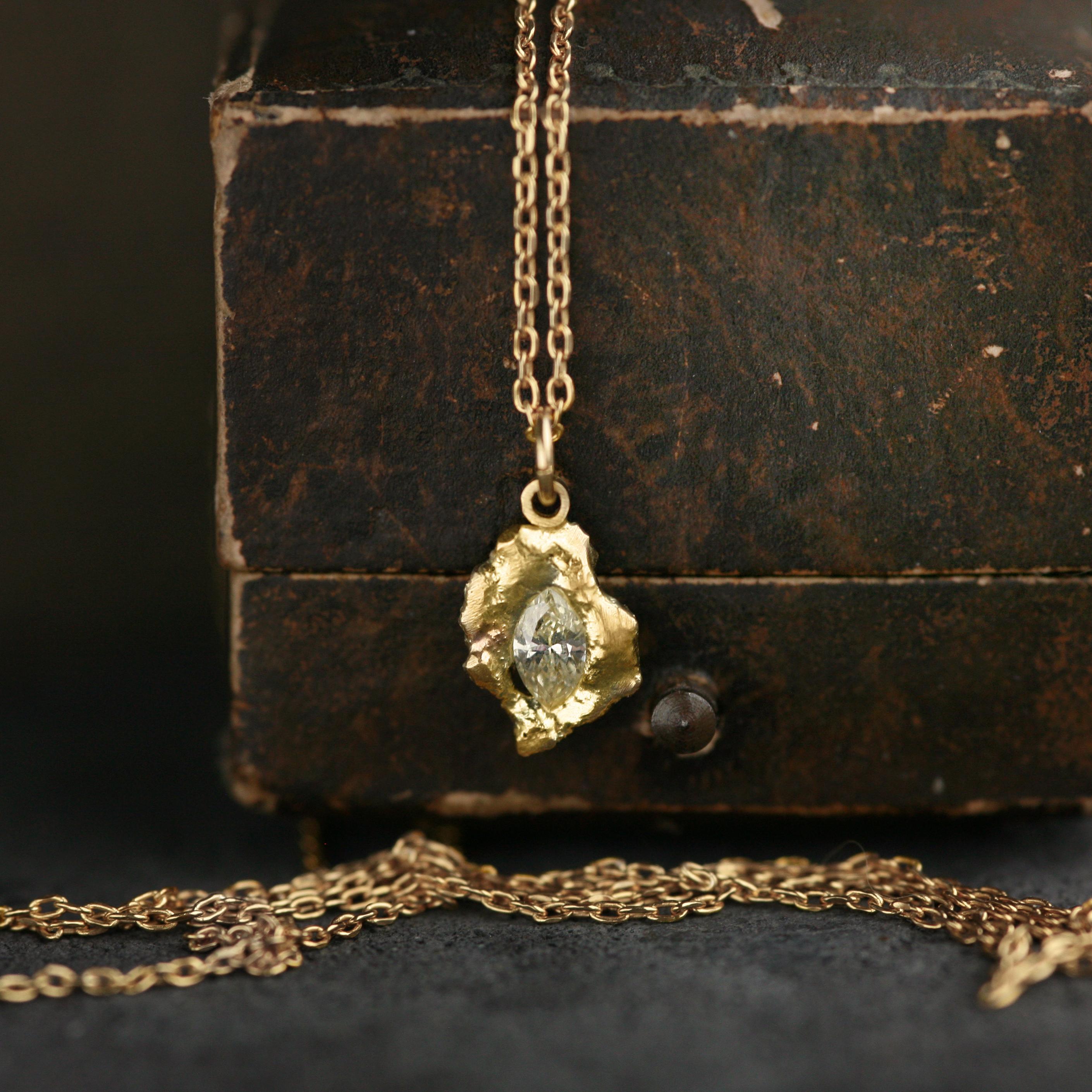 0.2 Carat Yellow Diamond Marquise and 18k Gold Solitaire Pendant.

Radiantly sculpted in 18k yellow gold, the Lava Naples Pendant nests a marquise-shaped yellow diamond within its compact silhouette. Created with Agata’s signature technique born of