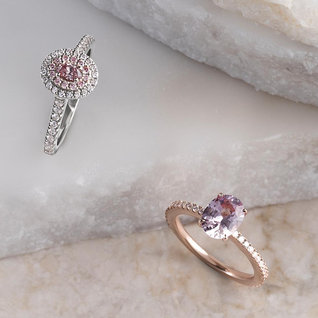 This divine Matthew Ely ring features a 0.20ct Argyle Pink Diamond 6PR (clarity VS1) at its centre with a first halo of 12 Pink Diamonds FP (clarity VS1 weighing 0.09ct), a second halo and a band of 39 White Diamonds (colour F / SI1 weighing