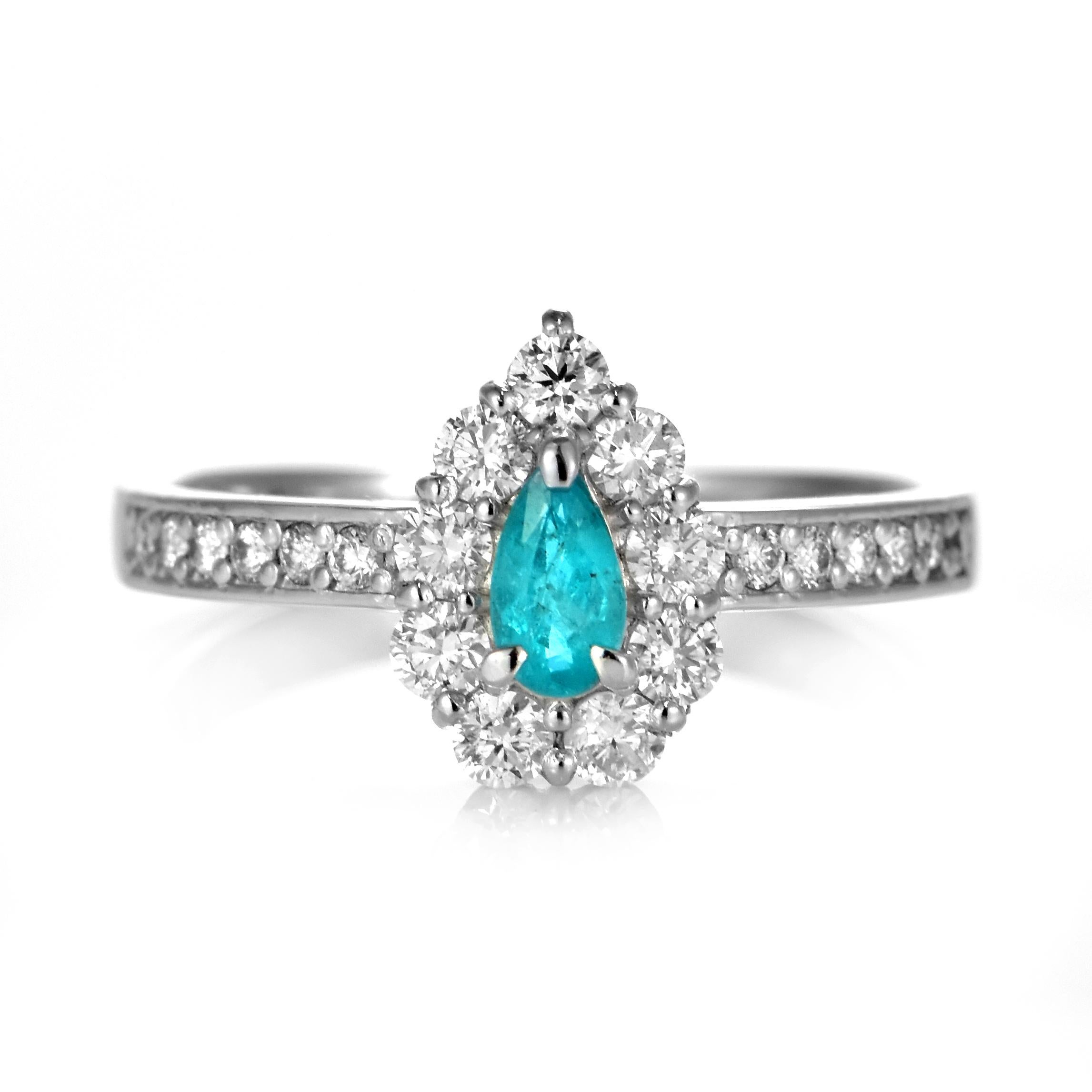 A beautiful ring featuring 0.20 Carat Natural Paraiba Tourmaline and 0.48 Carats of Diamond Accents made in Platinum. Paraiba Tourmalines were only discovered 30 years ago in the Brazilian state of the same name- Paraiba. Since then they have become