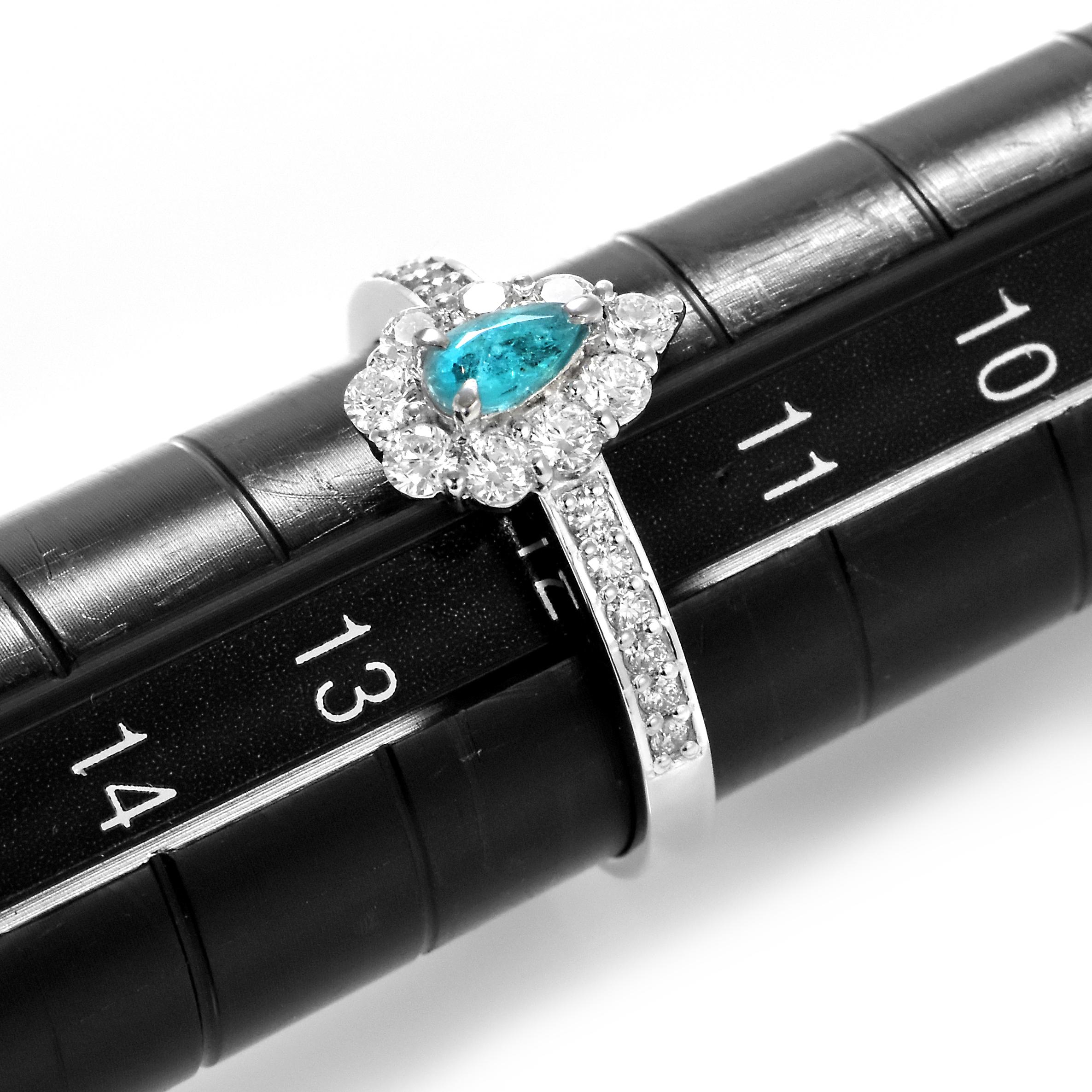 Pear Cut 0.20 Carat Brazilian Paraiba Tourmaline and Diamond Ring Made in Platinum For Sale