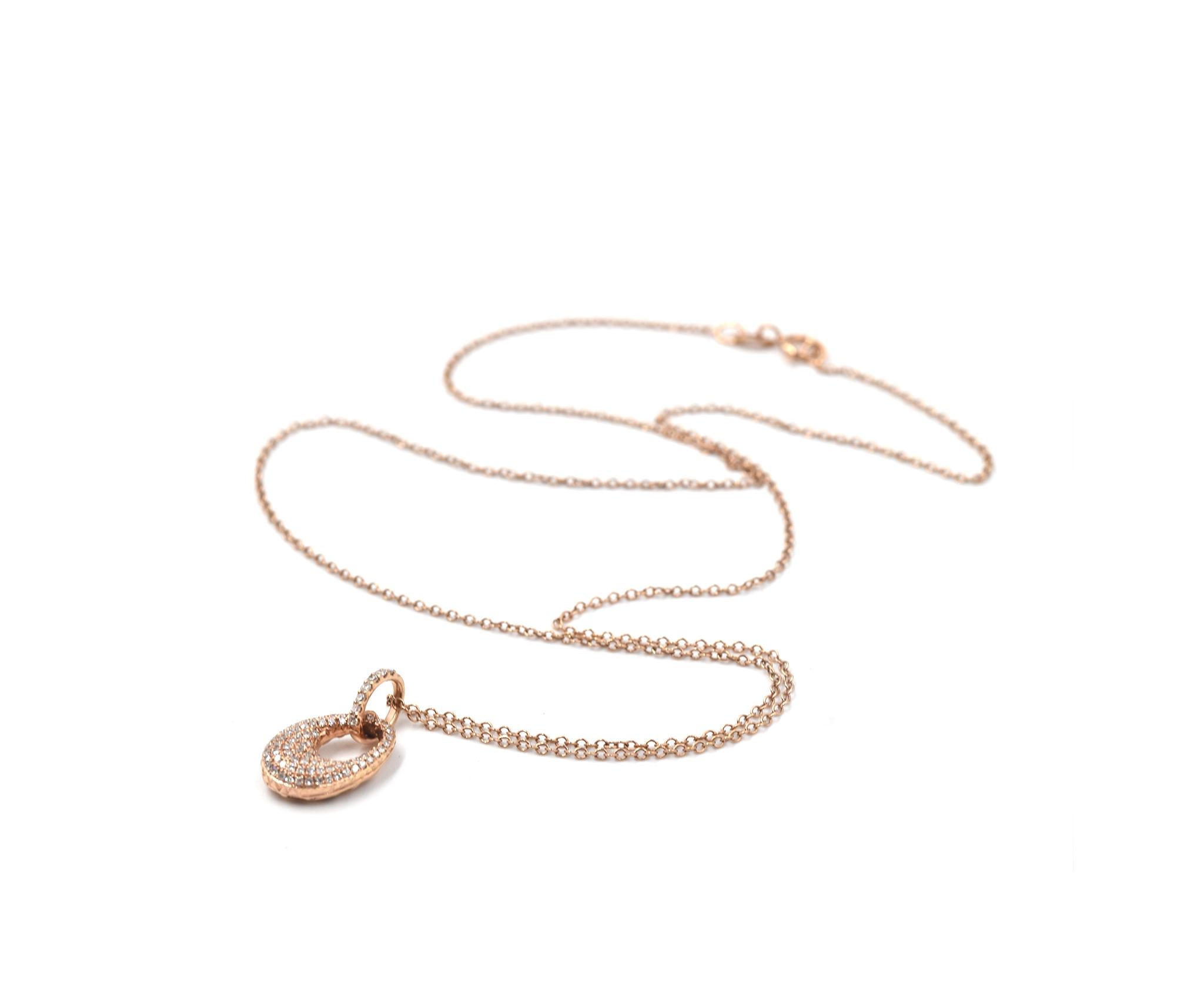 Designer: custom design
Material: 14k rose gold
Diamonds: 79 round brilliant cuts = 0.20 carat weight
Color: H-I
Clarity: SI2
Dimensions: necklace is 19-inch long
Weight: 2.25 grams
