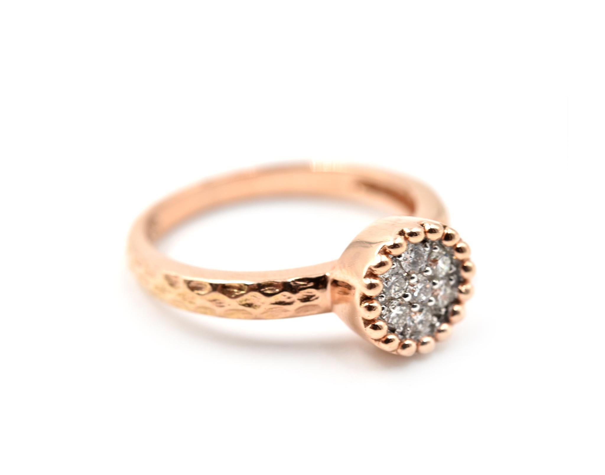 Designer: custom design
Material: 14k rose gold
Diamonds: seven round brilliant cuts = 0.20 carat weight
Color: H
Clarity: VS2-SI1
Ring Size: 7 (please allow two additional shipping days for sizing requests)
Weight: 3.8 grams

