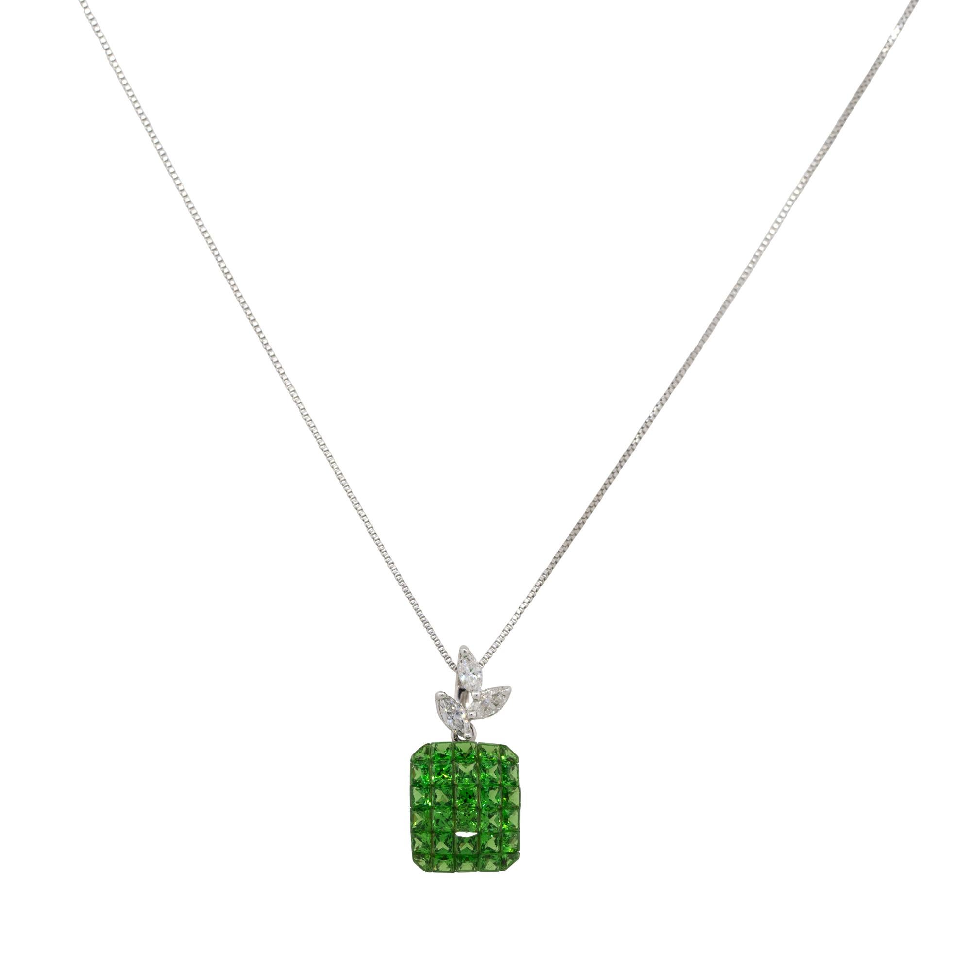 Material: 18k white gold
Diamond Details: Approx. 0.20ctw of round cut Diamonds. Diamonds are G/H in color and VS in clarity
Gemstone Details: Approx. 2.62ctw of green Garnet gemstones
Clasps: Lobster clasp
Total Weight: 3.5g (2.3dwt) 
Pendant