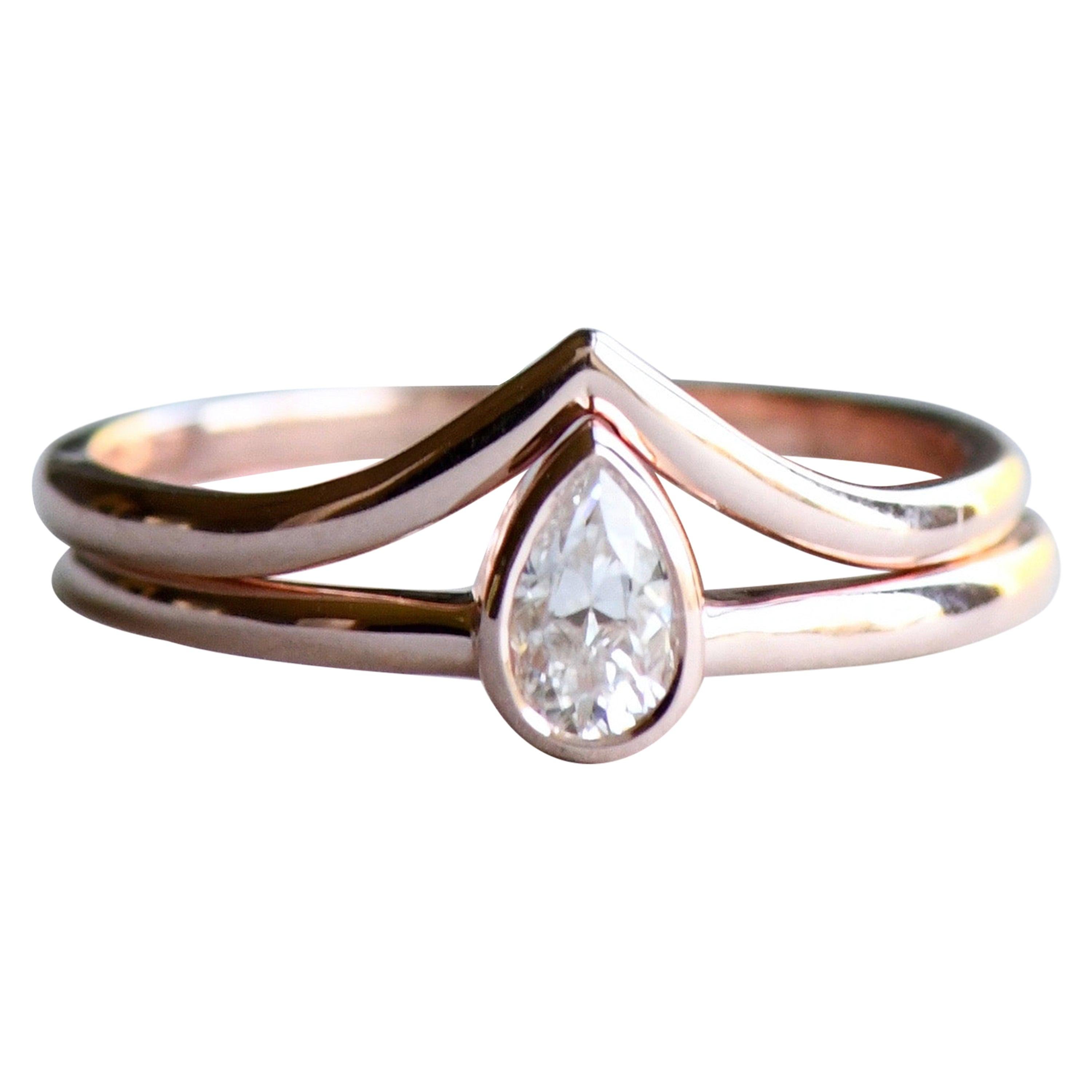 0.20 Carat Diamond Teardrop Ring Stacked with Chevron Rose Gold Ring