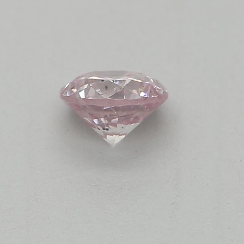 Women's or Men's 0.20 Carat Fancy Light Pink Round Cut Diamond I1 Clarity GIA Certified For Sale