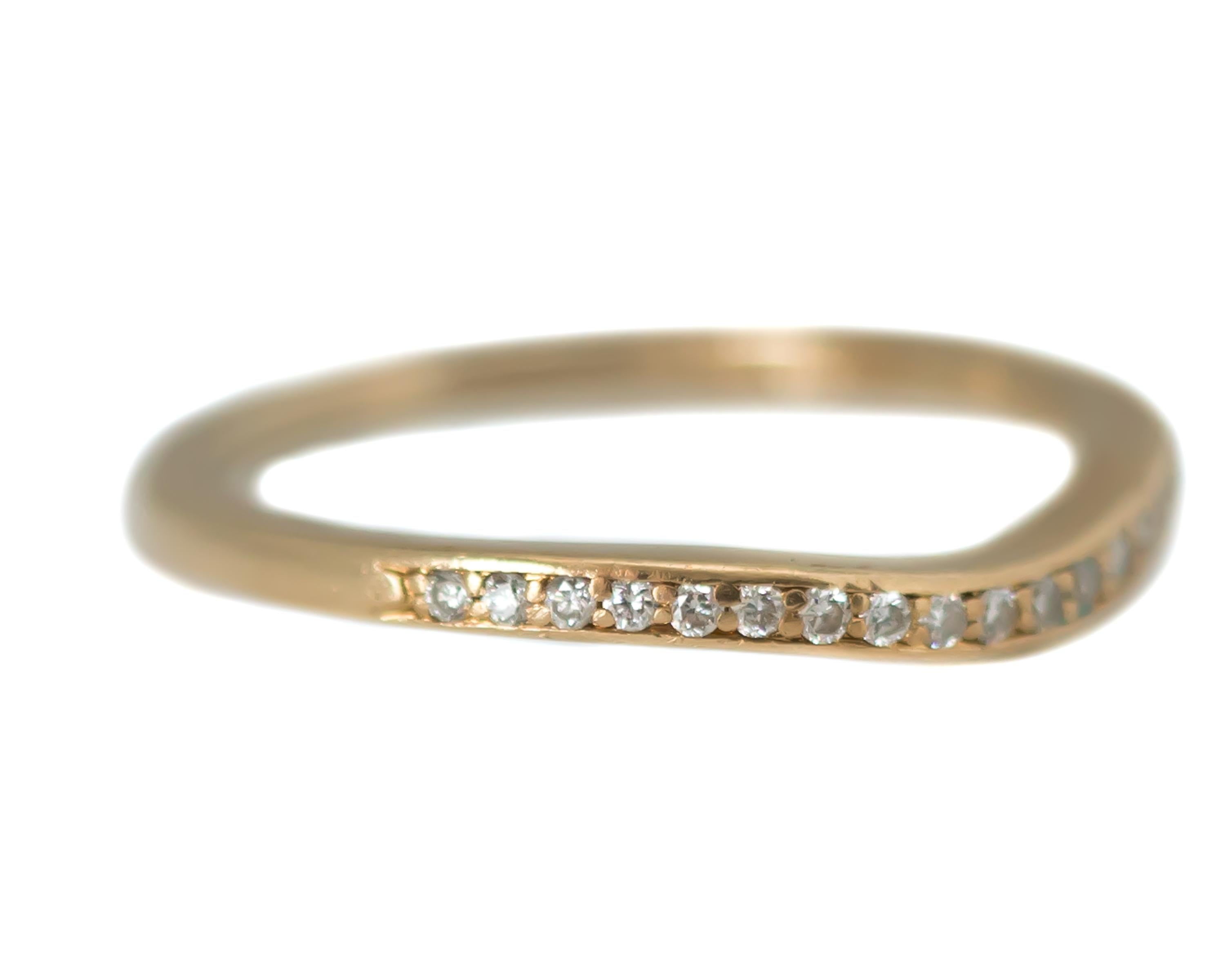 Curved Wedding Band - 14 Karat Yellow Gold, Diamonds

Features: 
0.20 carat total Round Brilliant Diamonds
14 Karat Yellow Gold setting
Curved front to accommodate an engagement ring
Prong set stones
1.5 millimeter wide band
2 millimeters finger to
