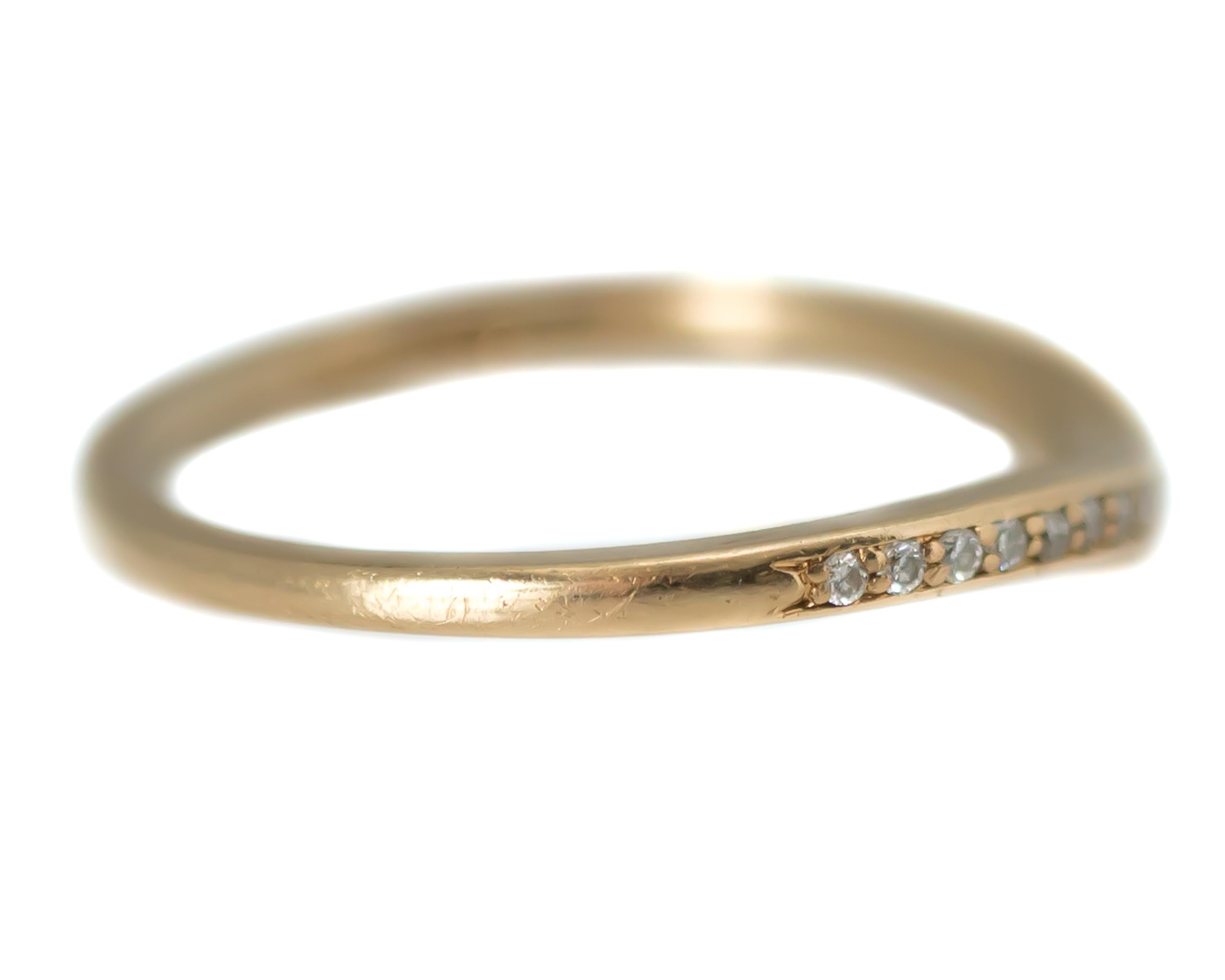 curved wedding band yellow gold