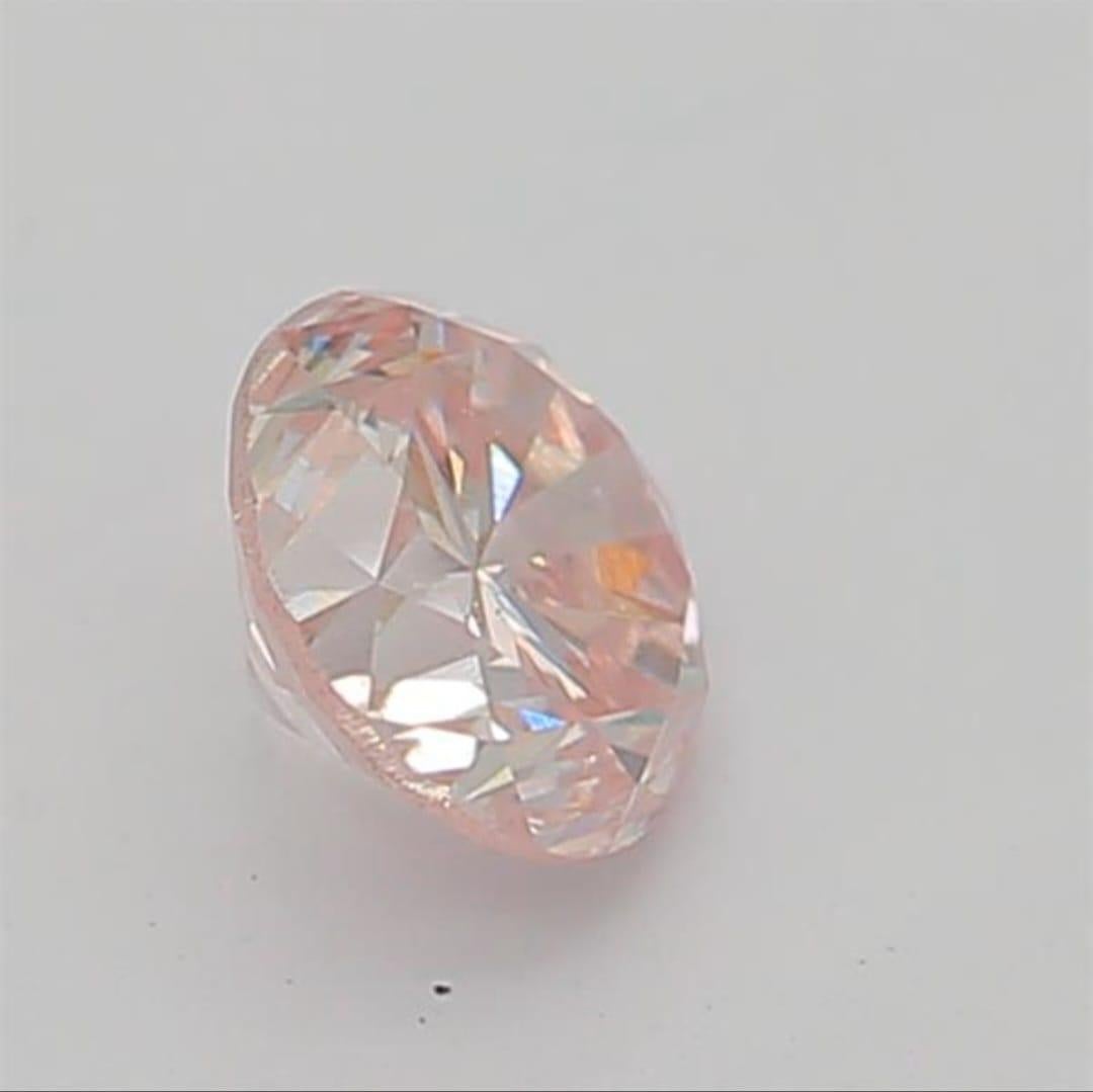 Round Cut 0.20 Carat Very Light Pink Round shaped diamond SI1 Clarity CGL Certified For Sale