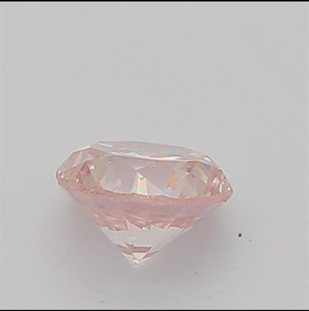 Women's or Men's 0.20 Carat Very Light Pink Round shaped diamond SI1 Clarity CGL Certified For Sale