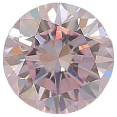 Diamant rose très clair de forme ronde de 0,20 carat de pureté VS1 certifié CGL