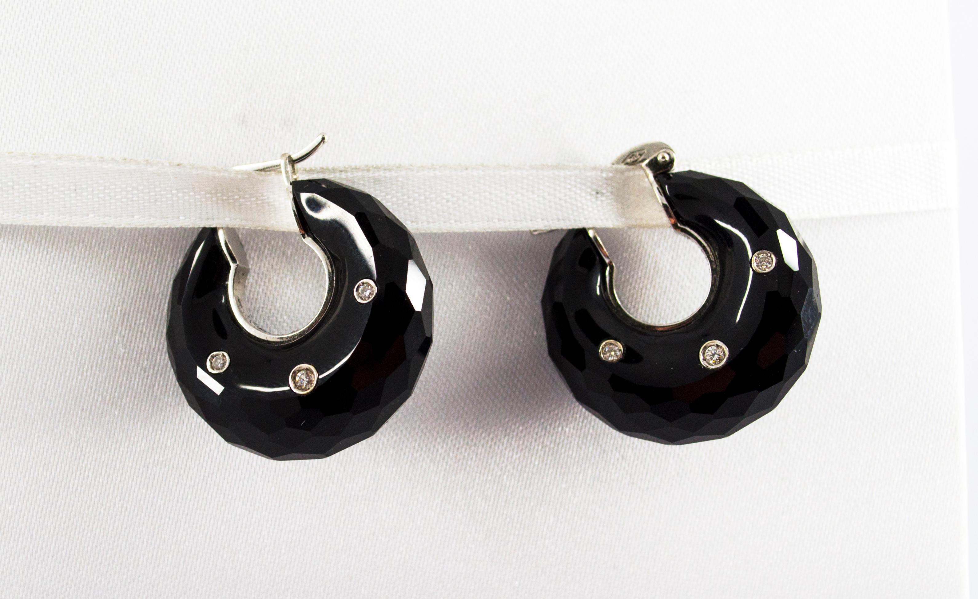 These Earrings are made of 18K White Gold.
These Earrings have 0.20 Carats of White Diamonds.
These Earrings have also Onyx.
All our Earrings have pins for pierced ears but we can change the closure and make any of our Earrings suitable even for