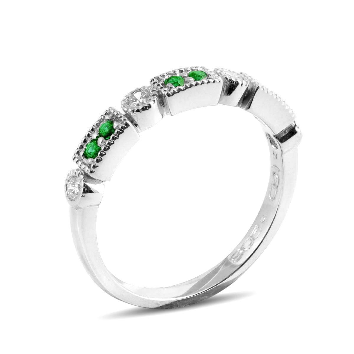 A beautiful stackable ring set with vibrant Tsavorites has got us all green with envy. The rich color of the gemstone paired with the sparkle of the diamonds is exactly what gives this ring its charm. An easy choice to pair with other piece of
