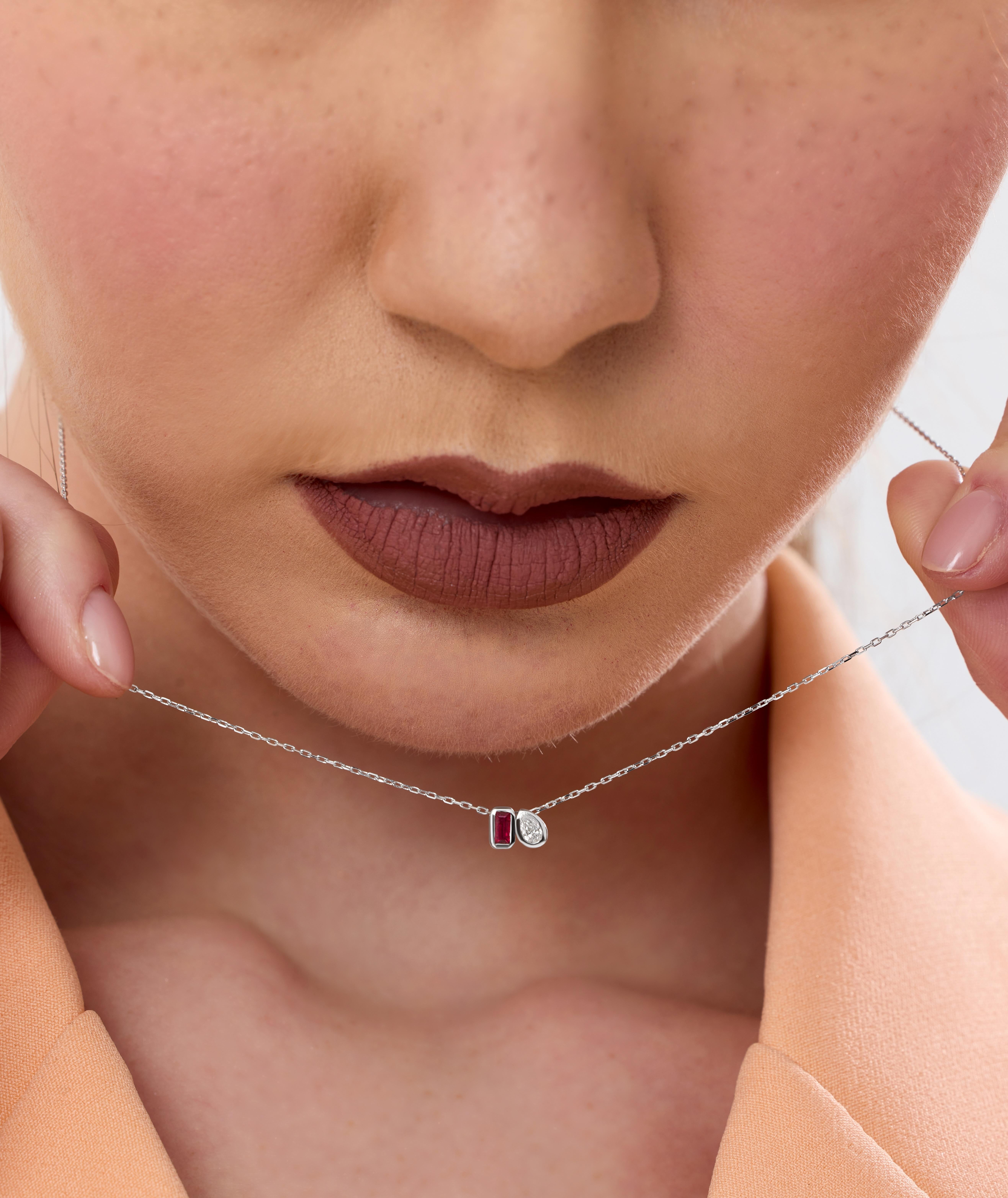 Collana in oro con diamanti e rubini 